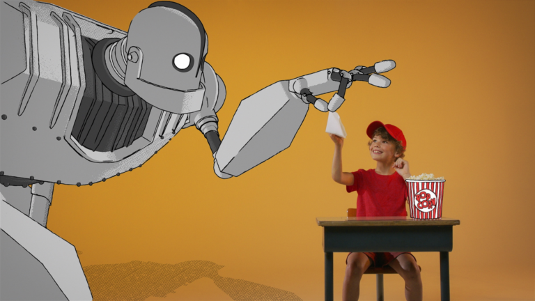 leer film spreken jongen aan schooltafel geeft robot een hand